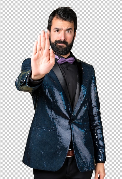 PSD handsome man with sequin jacket making stop sign