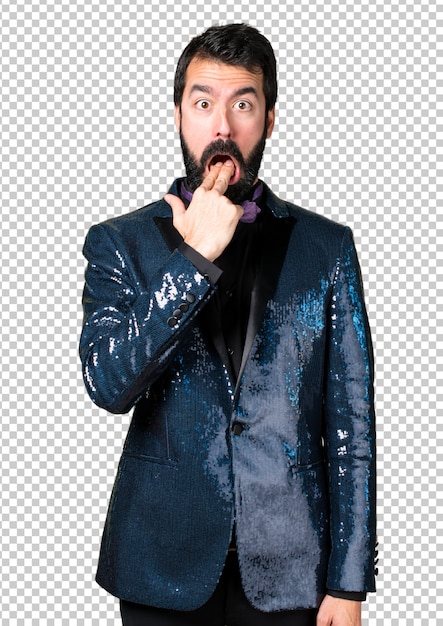 Handsome man with sequin jacket making vomiting gesture