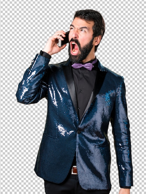 Handsome man with sequin jacket talking to mobile