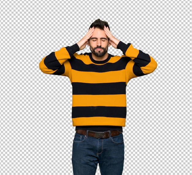 Handsome man with striped sweater unhappy and frustrated with something