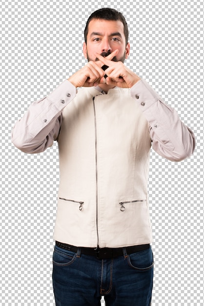 Handsome man with vest making silence gesture