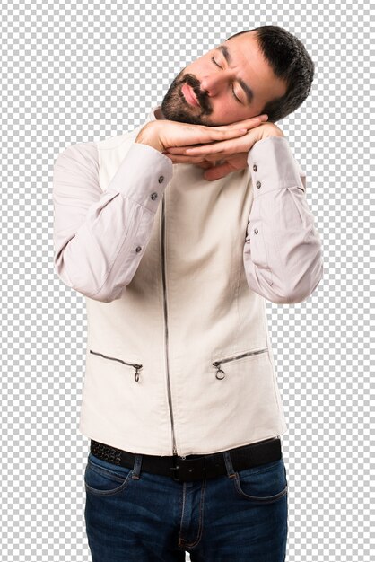 handsome man with vest making sleep gesture