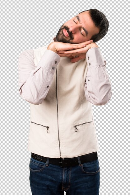 Handsome man with vest making sleep gesture