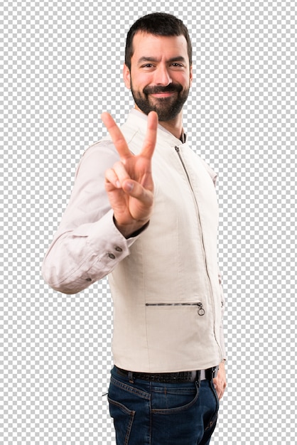 PSD handsome man with vest making victory gesture