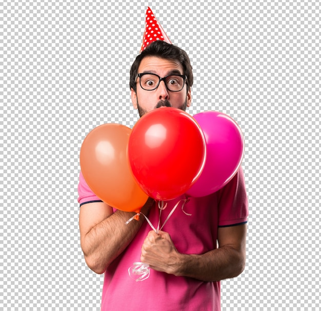 PSD handsome young man holding balloons