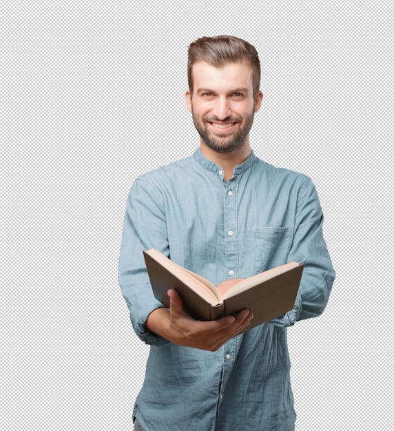 Handsome young man reading in book