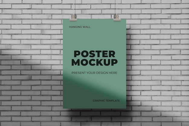 Hanging effect poster mockup on brick wall