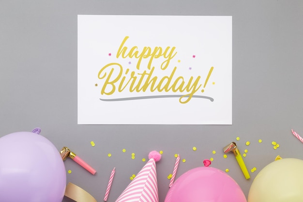 PSD happy birthday background, flat lay party decoration with flyer invitation card mockup template.