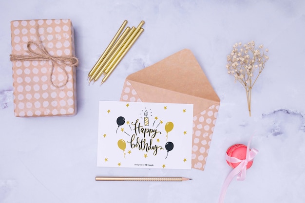 PSD happy birthday mock-up with dried flower and envelope