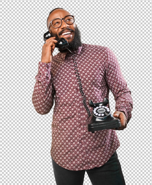 Happy black man talking on telephone