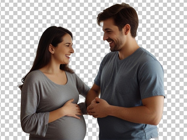 Happy couple feeling movements of baby belly of the expectant mother