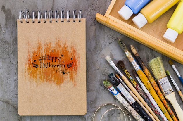 Happy halloween message on notebook