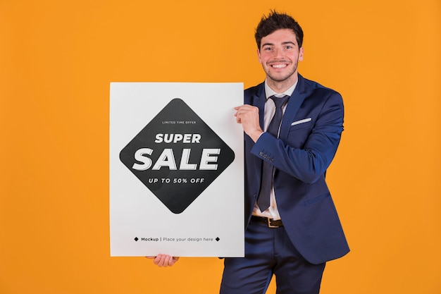 Happy man holding a placard concept mock-up