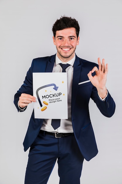 Happy man holding a placard concept mock-up