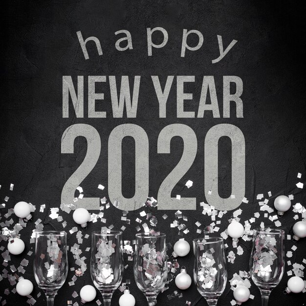 Happy new year 2020 with balls and glasses