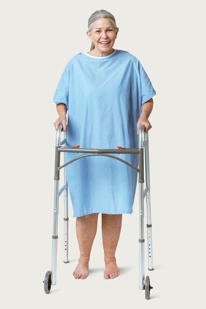 Happy senior patient using a zimmer frame