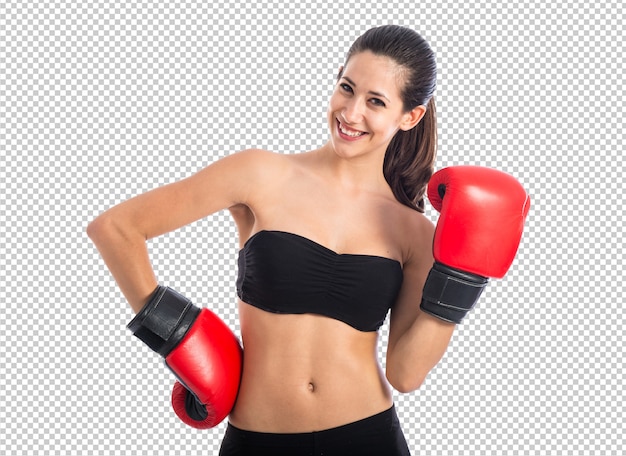 Donna sportiva felice con i guantoni da boxe