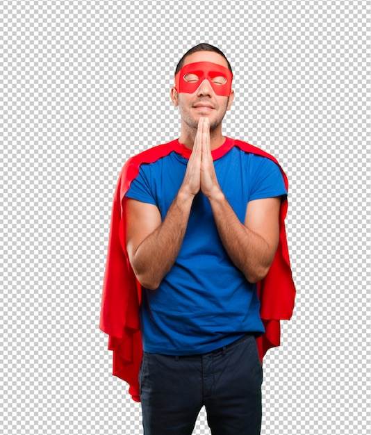 Happy superhero praying