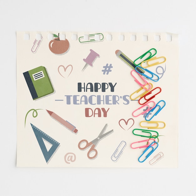 Happy teachers day with school supplies top view