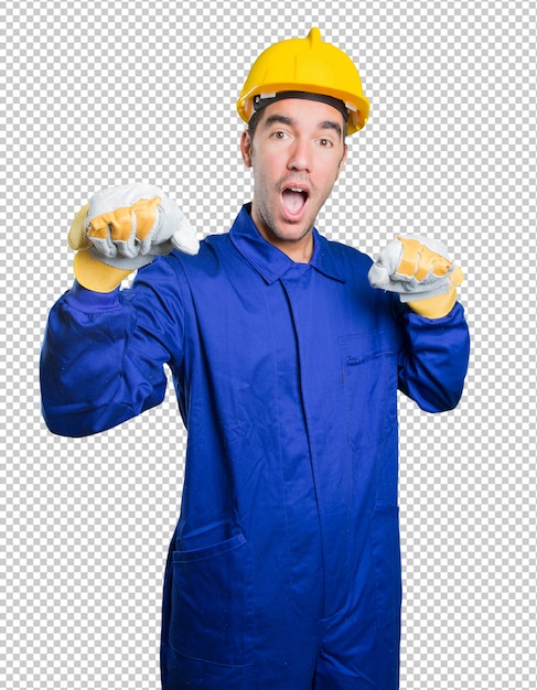 PSD happy workman showing his fist on white background