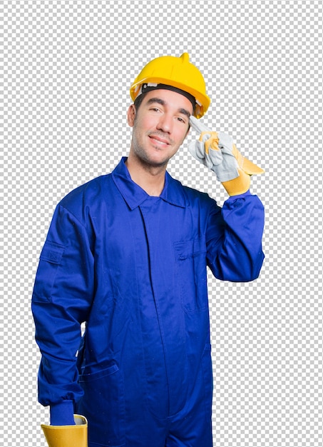 Happy workman with concentration gesture on white background