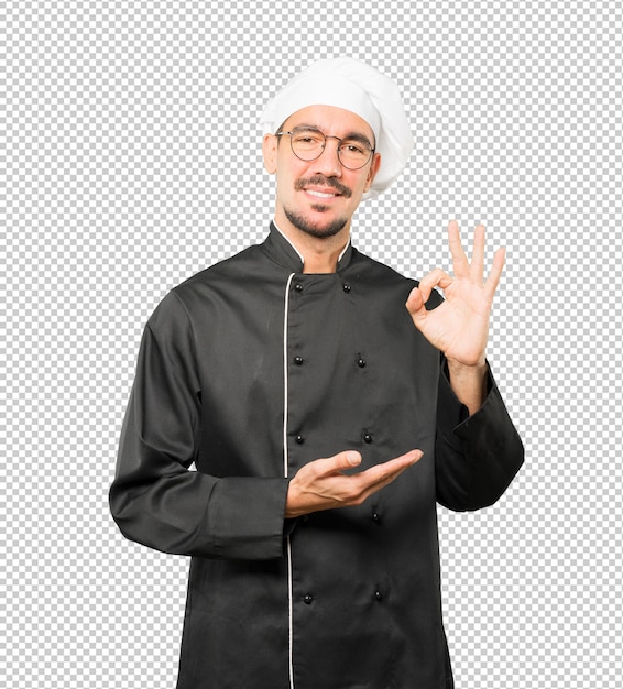 PSD happy young chef doing an all right gesture