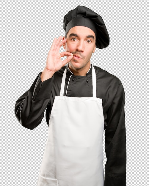 PSD happy young chef doing a silence gesture