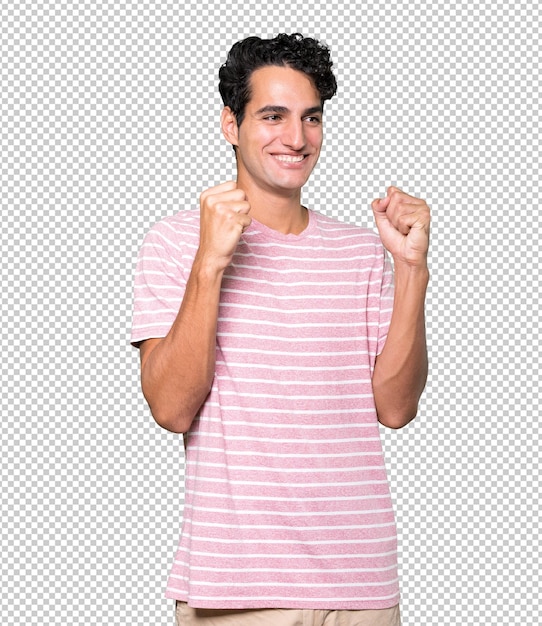 Happy young man doing a competitive gesture