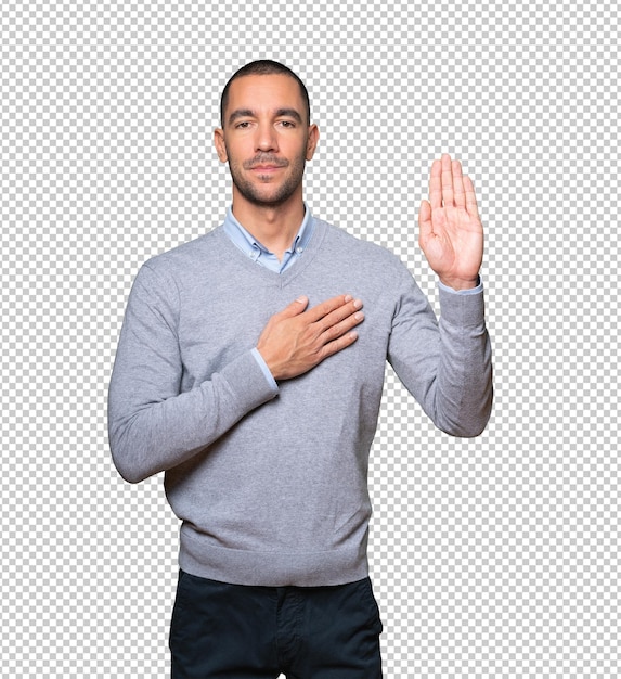 Happy young man doing a gesture of meditation