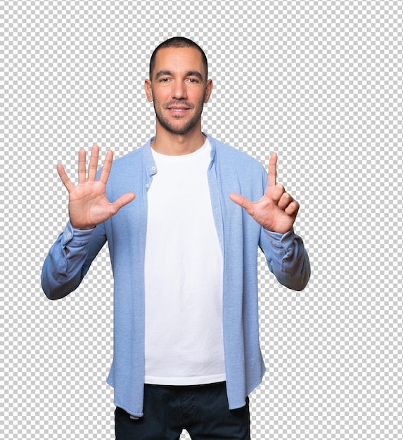 PSD happy young man doing a number seven gesture with his hands