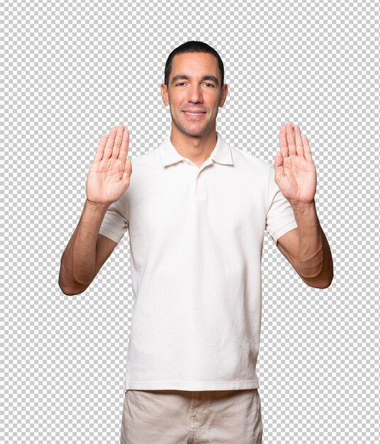 PSD happy young man making a gesture of stop with his palm