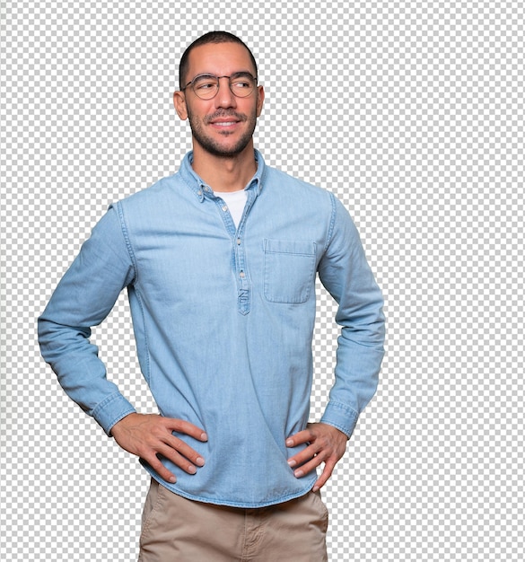 Happy young man posing against background