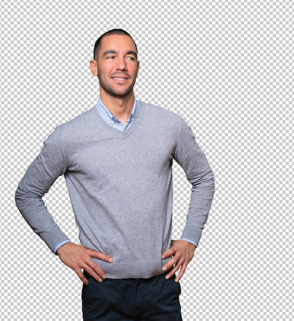 Happy young man posing against background