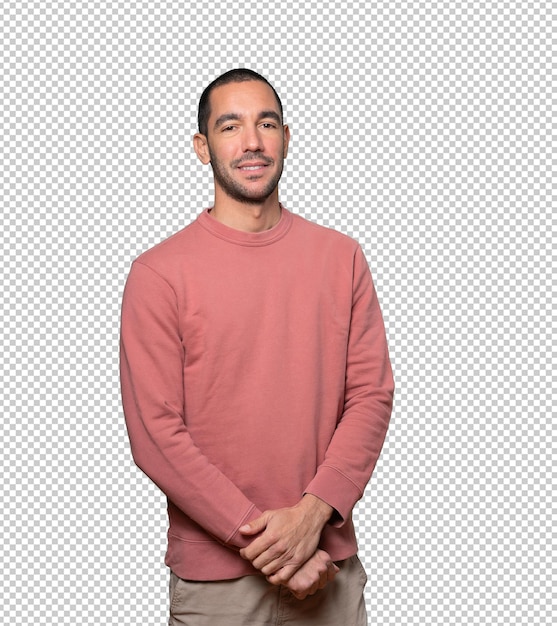 Happy young man posing against background