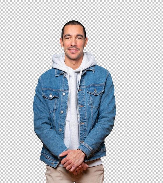 Happy young man posing against background