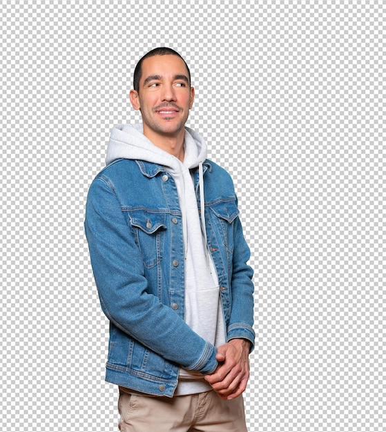 happy young man posing against background