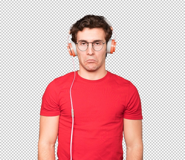 PSD happy young man using a headphones