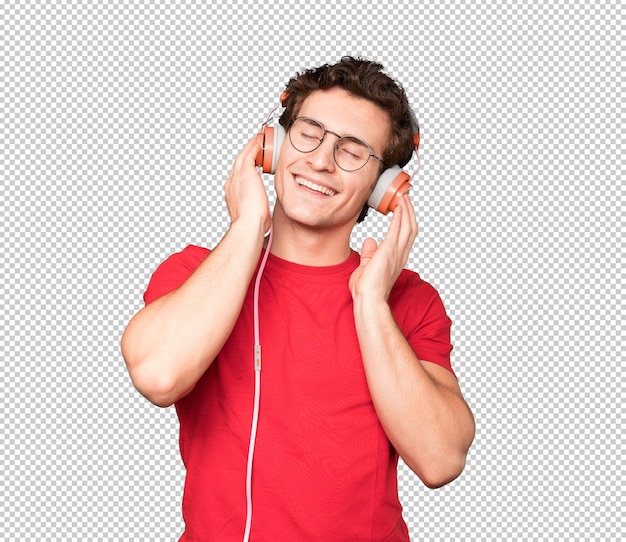 PSD happy young man using a headphones