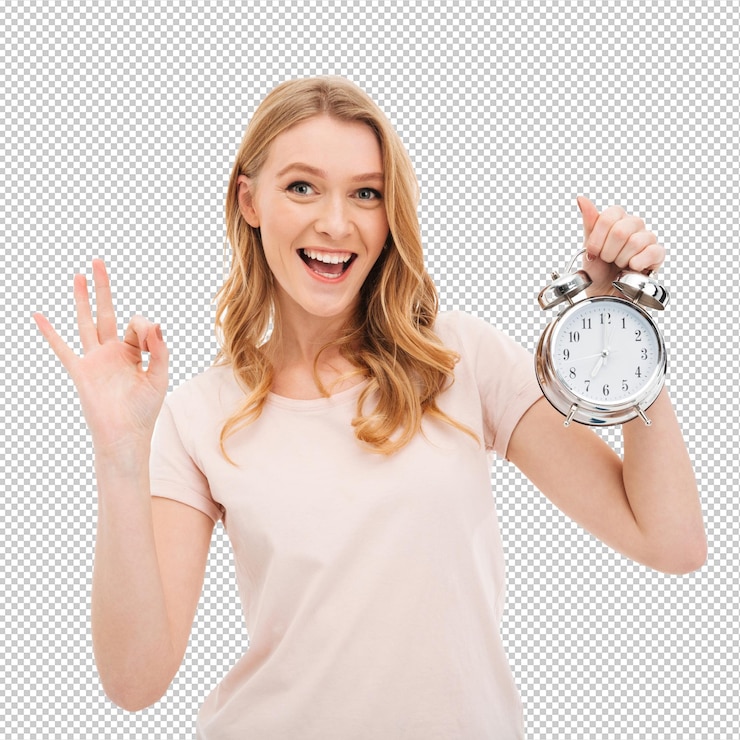 PSD happy young woman holding alarm clock showing ok gesture