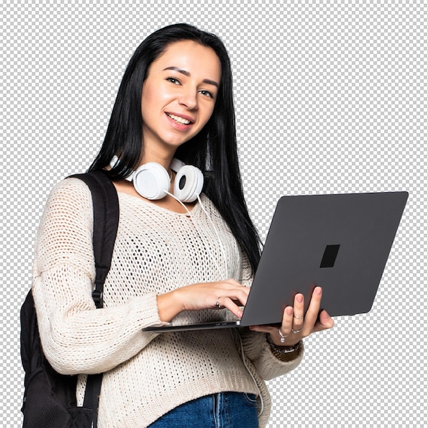 happy young woman holding laptop and over gray wall psd file
