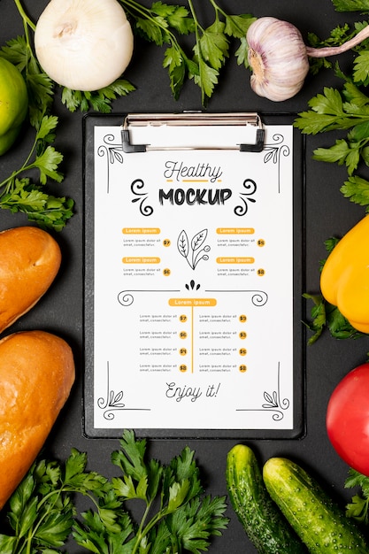 Healthy breakfast with veggies and clipboard