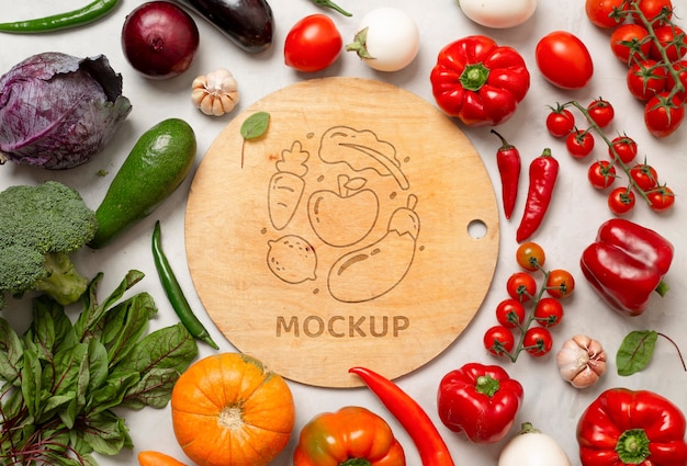 Healthy organic vegetables with mock-up wooden board