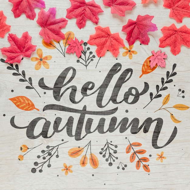 PSD hello autumn calligraphy with pink dried leaves