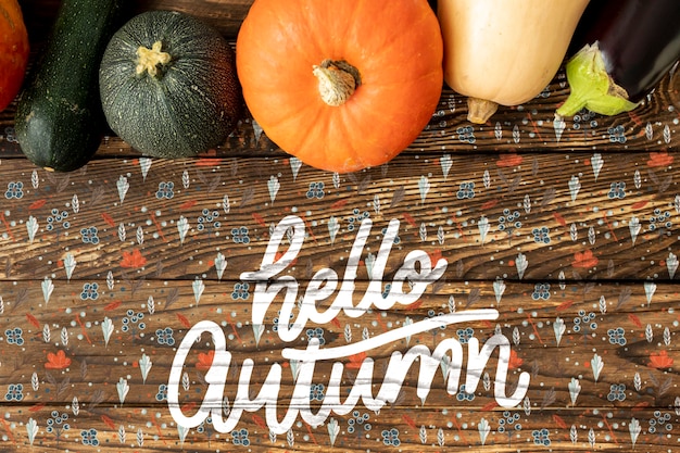 Hello autumn hand lettering phrase with veggies