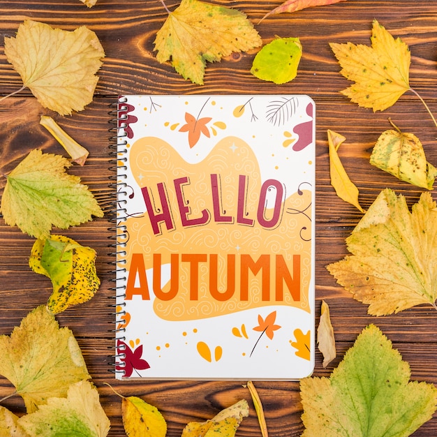 PSD hello autumn message on notebook with mock-up