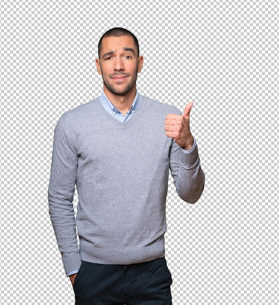 hesitant young man gesturing that everything is fine