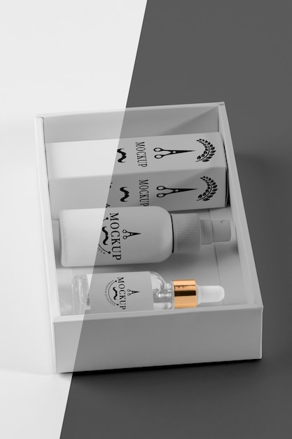high angle of barbershop products box with serum