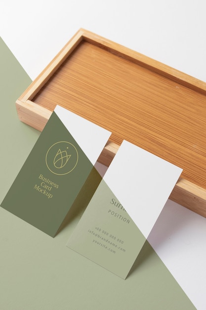 high angle business cards with wooden piece