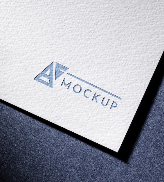 High angle of business mock-up card with textured surface paper