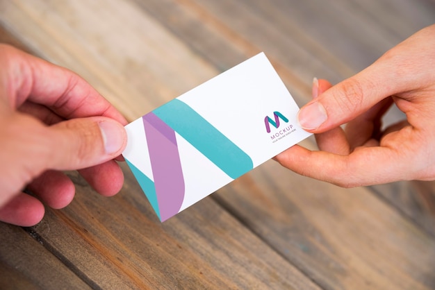 high angle of business people exchanging business cards